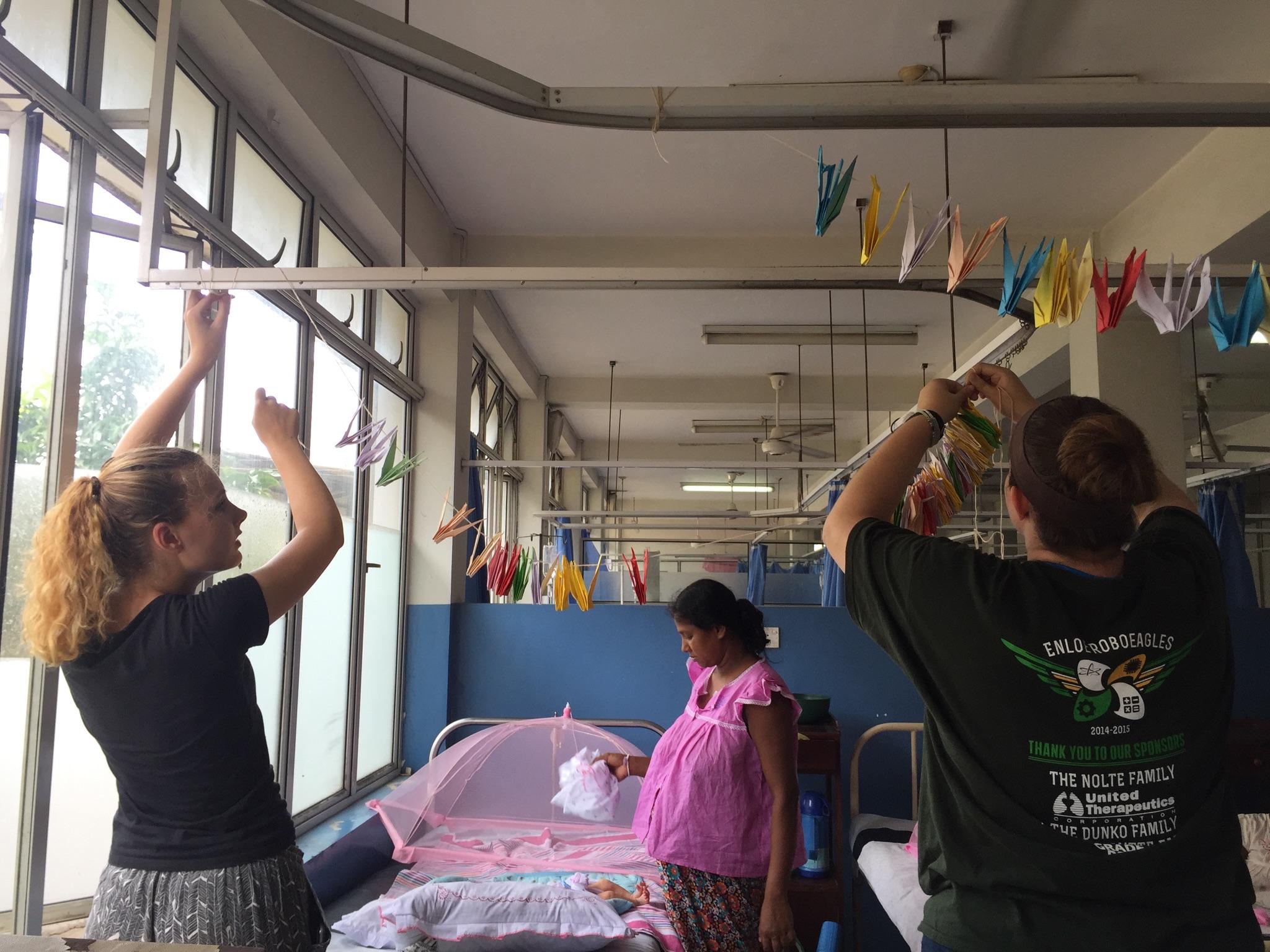 A group of Projects Abroad interns decorating the childrens room at the local hospital after completing their midwifery internships in Sri Lanka. A group of interns from Projects Abroad are seen decorating the childrens room at a local hospital whilst on their midwifery internships in Sri Lanka.